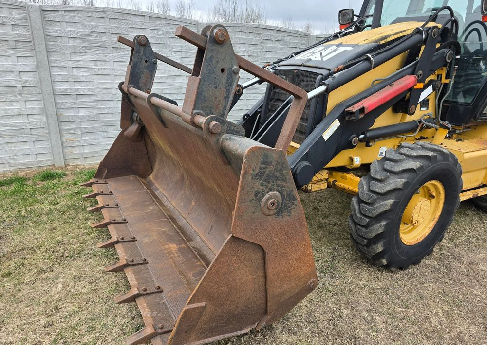 Caterpillar - Tractopelle: photos 4 Caterpillar - Tractopelle: photos 4