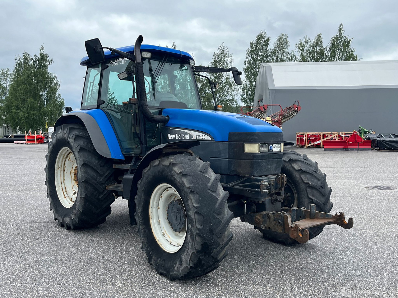 New Holland TM155, traktori etunostolaitteeella, 2004,, Salo - Machine agricole: photos 4 New Holland TM155, traktori etunostolaitteeella, 2004,, Salo - Machine agricole: photos 4
