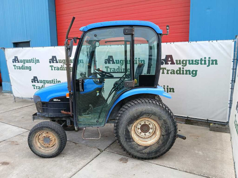 New Holland TC 27 - Tracteur agricole: photos 1 New Holland TC 27 - Tracteur agricole: photos 1