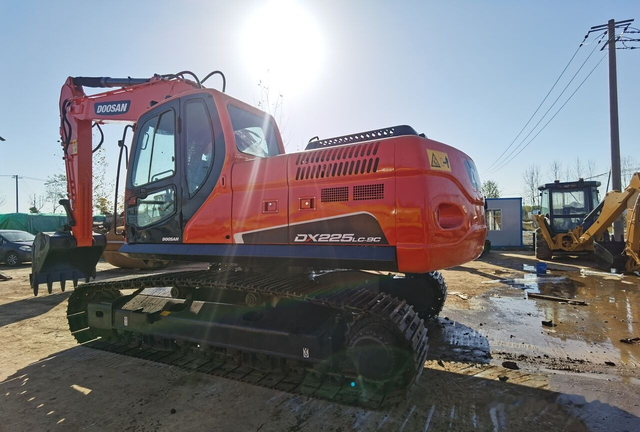 Doosan DX225LC - Pelle sur chenille: photos 3 Doosan DX225LC - Pelle sur chenille: photos 3