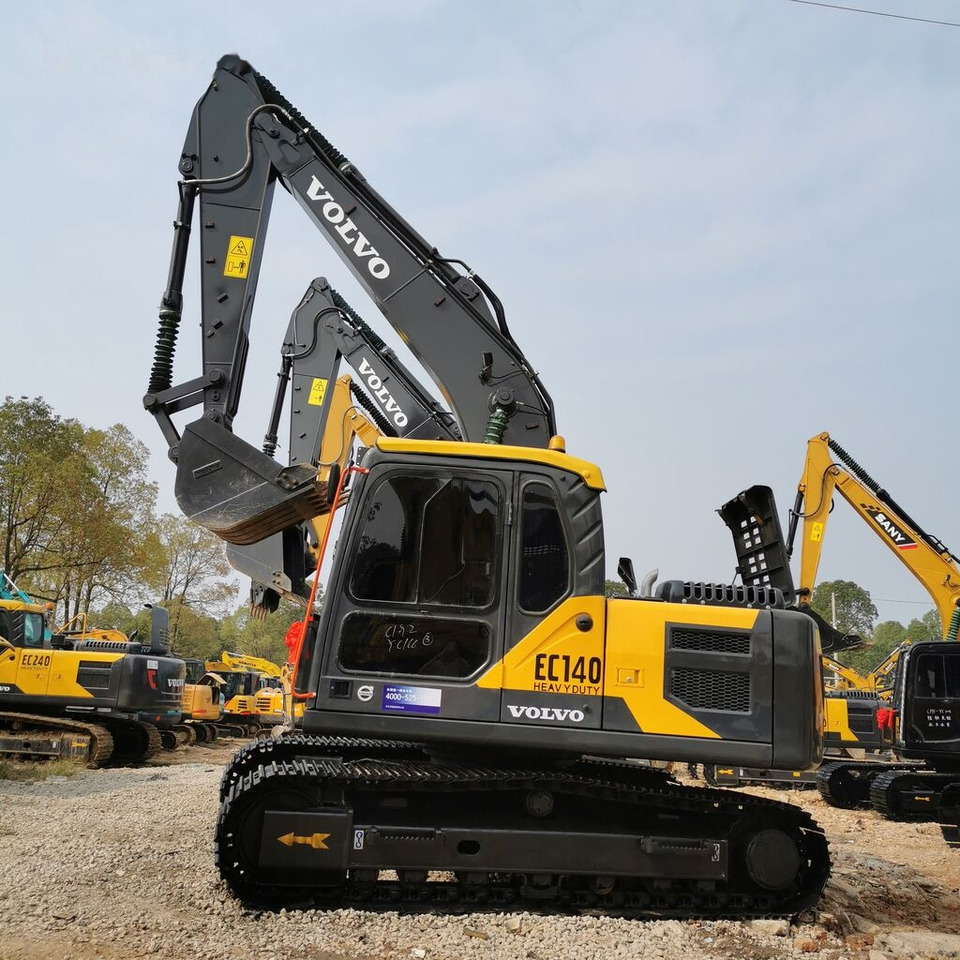 Volvo EC140 - Pelle sur chenille: photos 1 Volvo EC140 - Pelle sur chenille: photos 1