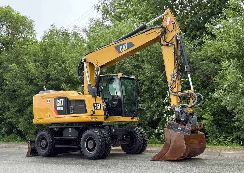 Caterpillar CAT 318 F * Powertilt * Sprowadzony* 9700 MTG * Caterpillar * Stan Perfekcyjny - Pelle sur pneus: photos 2 Caterpillar CAT 318 F * Powertilt * Sprowadzony* 9700 MTG * Caterpillar * Stan Perfekcyjny - Pelle sur pneus: photos 2