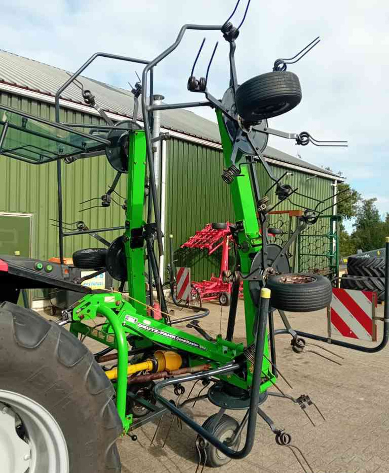 Deutz-Fahr Condimaster 6821 schudder weidebouwmachines - Faneuse: photos 1 Deutz-Fahr Condimaster 6821 schudder weidebouwmachines - Faneuse: photos 1