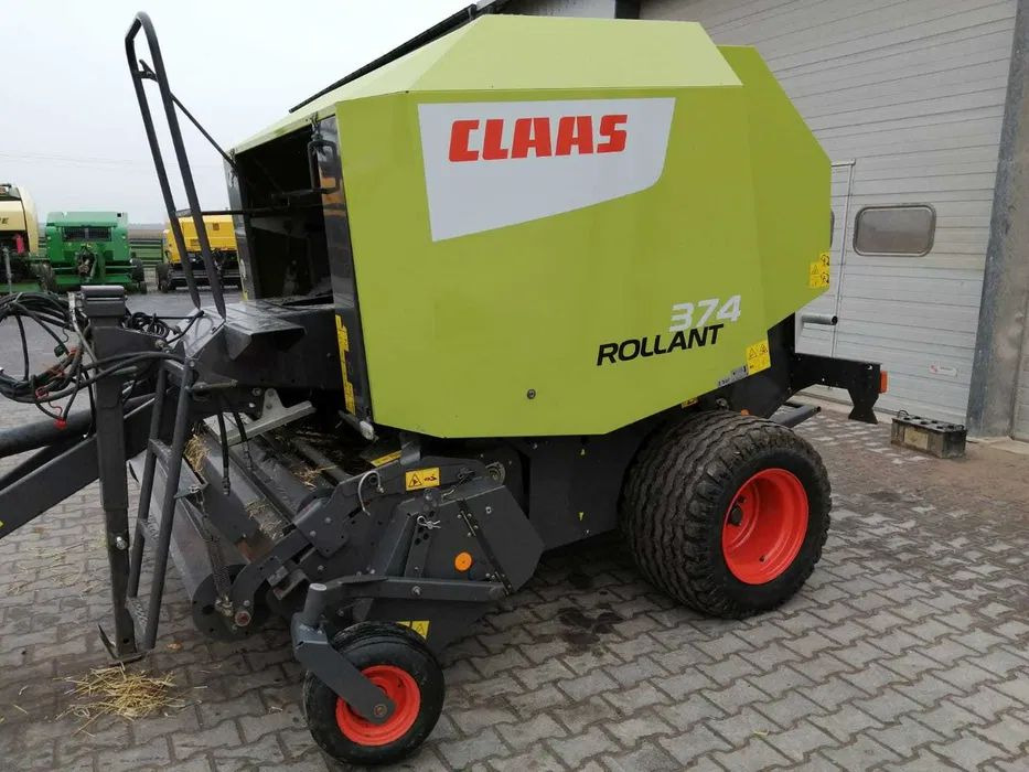 Prasa rolująca Claas Rollant 374 - Presse à balles rondes: photos 1 Prasa rolująca Claas Rollant 374 - Presse à balles rondes: photos 1