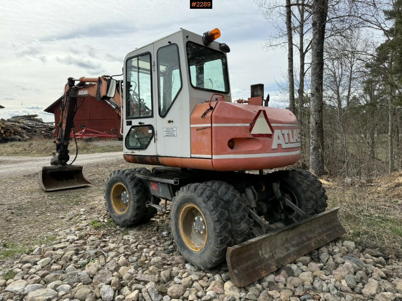 Wheeled excavator Atlas 1004 with attachments - Pelle sur pneus: photos 3 Wheeled excavator Atlas 1004 with attachments - Pelle sur pneus: photos 3