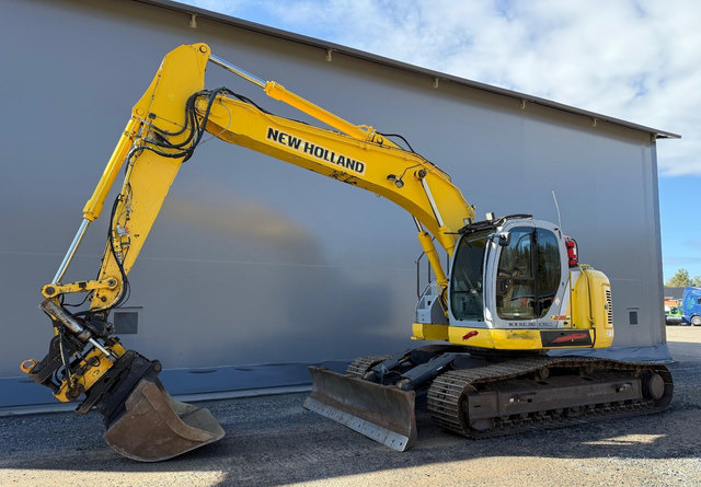 New HollandE235SR - Pelle sur chenille: photos 1 New HollandE235SR - Pelle sur chenille: photos 1