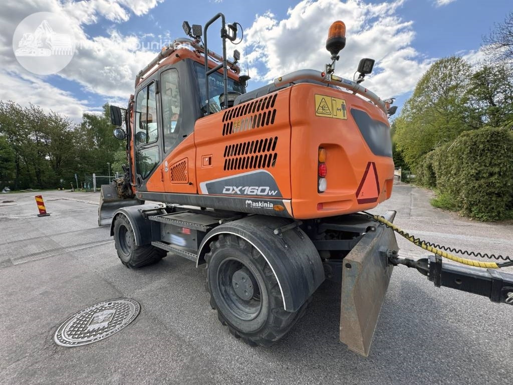 Doosan DX 160 W - Pelle sur pneus: photos 2 Doosan DX 160 W - Pelle sur pneus: photos 2