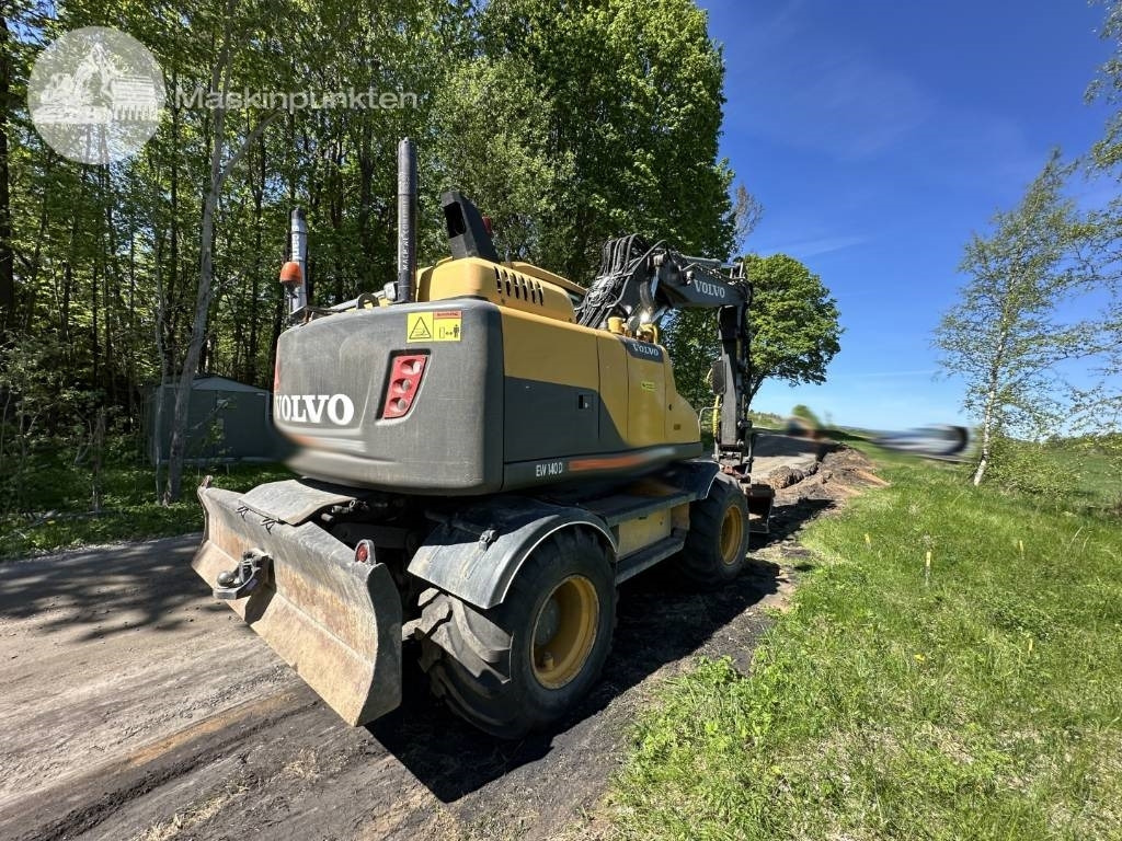 Volvo EW 140 D - Pelle sur pneus: photos 5 Volvo EW 140 D - Pelle sur pneus: photos 5