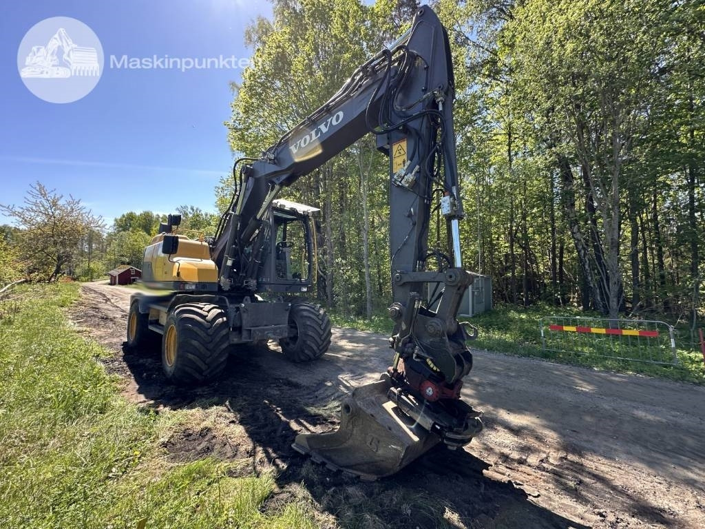 Volvo EW 140 D - Pelle sur pneus: photos 3 Volvo EW 140 D - Pelle sur pneus: photos 3