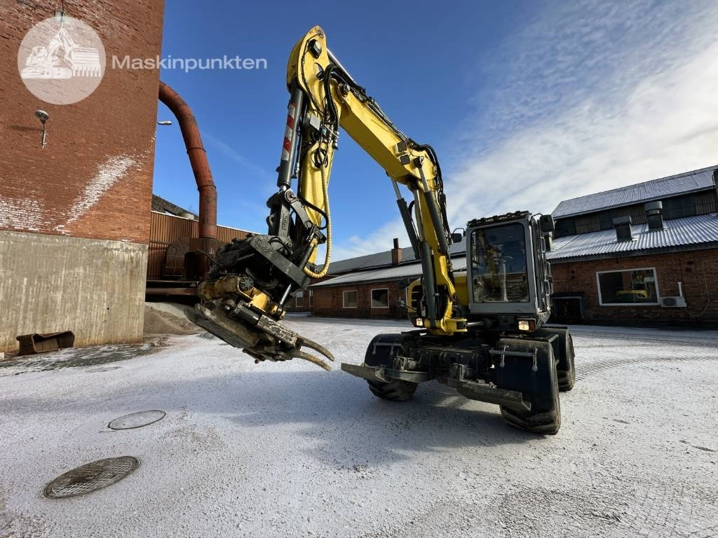 Wacker Neuson EW 100 - Pelle sur pneus: photos 1 Wacker Neuson EW 100 - Pelle sur pneus: photos 1