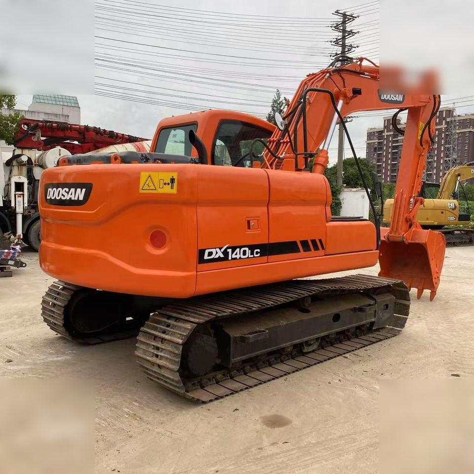 DOOSAN DX140 LC - Pelle sur chenille: photos 1 DOOSAN DX140 LC - Pelle sur chenille: photos 1