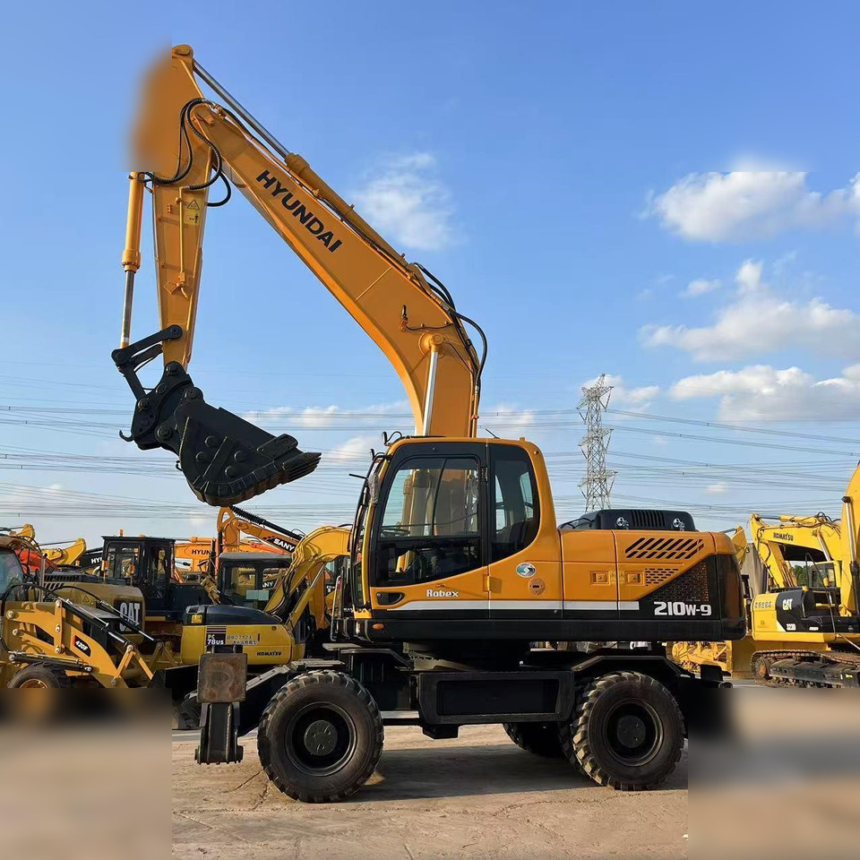 Pelle sur pneus HYUNDAI ROBEX 210W-9: photos 6 Pelle sur pneus HYUNDAI ROBEX 210W-9: photos 6