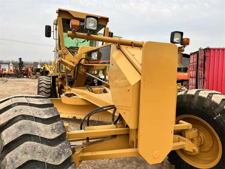 Used Caterpillar CAT 140H Land Road Motor Grader CAT140 CAT140H Used Grader Cheap Price for Sale - Niveleuse: photos 4 Used Caterpillar CAT 140H Land Road Motor Grader CAT140 CAT140H Used Grader Cheap Price for Sale - Niveleuse: photos 4