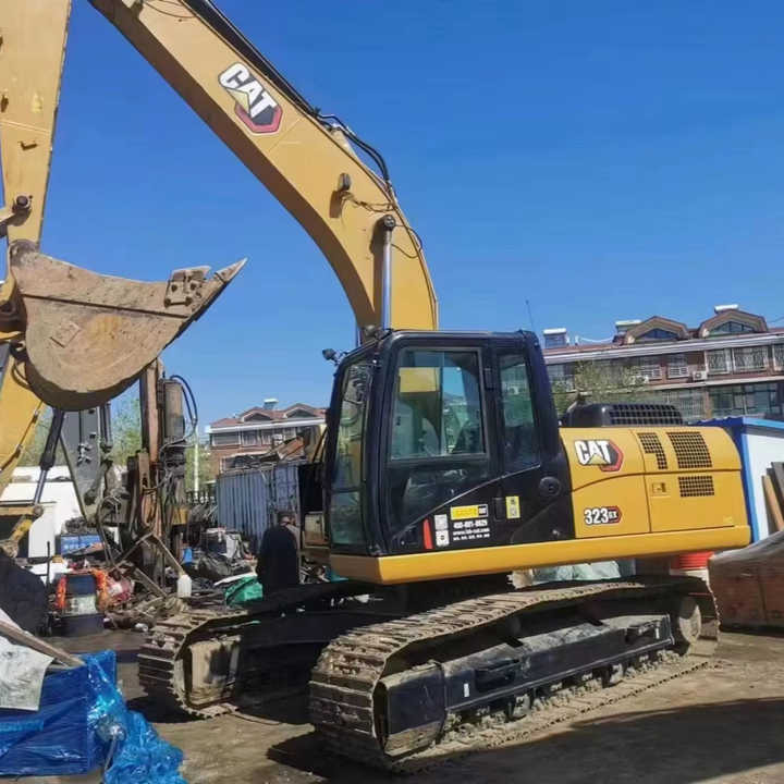 Used Digger CAT 323GX Construction Machinery Construction Digger Used CAT 323GX Cheap Excavator - Pelle sur chenille: photos 1 Used Digger CAT 323GX Construction Machinery Construction Digger Used CAT 323GX Cheap Excavator - Pelle sur chenille: photos 1
