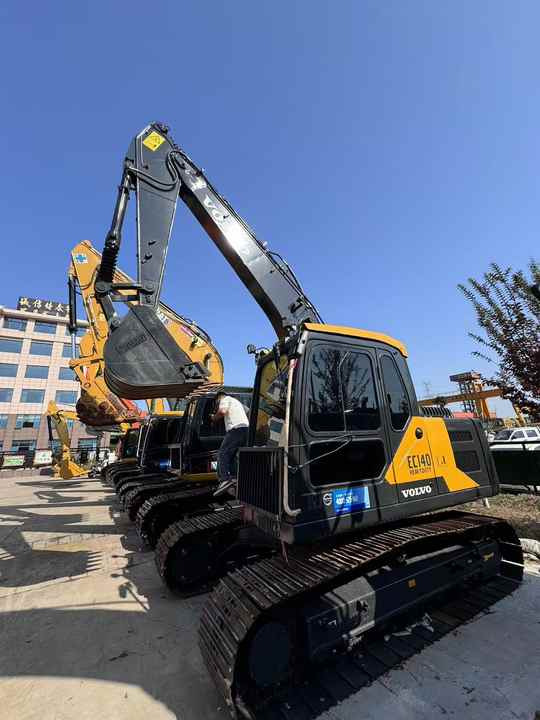 Used Digger VOLVO EC140 Construction Machinery Construction Digger Used VOLVO EC140 Cheap Excavator - Pelle sur chenille: photos 4 Used Digger VOLVO EC140 Construction Machinery Construction Digger Used VOLVO EC140 Cheap Excavator - Pelle sur chenille: photos 4