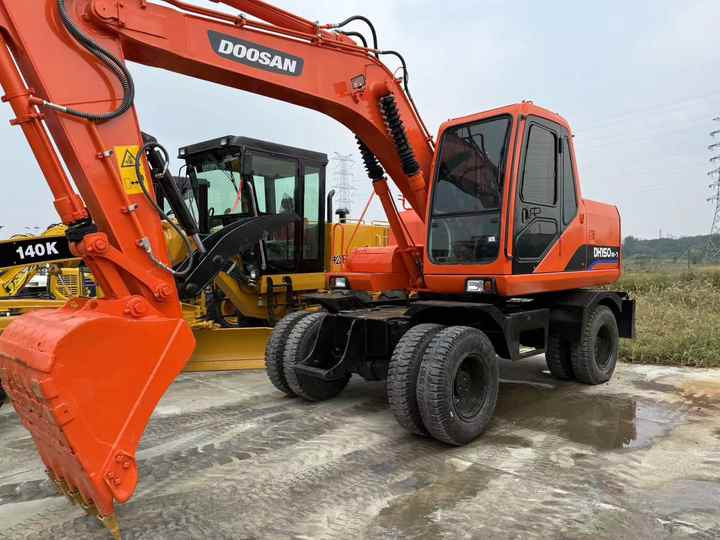90% Brand New Doosan Brand Dh150w-7 Wheel Excavator in Stock Used Korea Brand Doosan Dh55 Dh60 Dh150 Dh210 Excavator for Sale - Pelle sur pneus: photos 2 90% Brand New Doosan Brand Dh150w-7 Wheel Excavator in Stock Used Korea Brand Doosan Dh55 Dh60 Dh150 Dh210 Excavator for Sale - Pelle sur pneus: photos 2