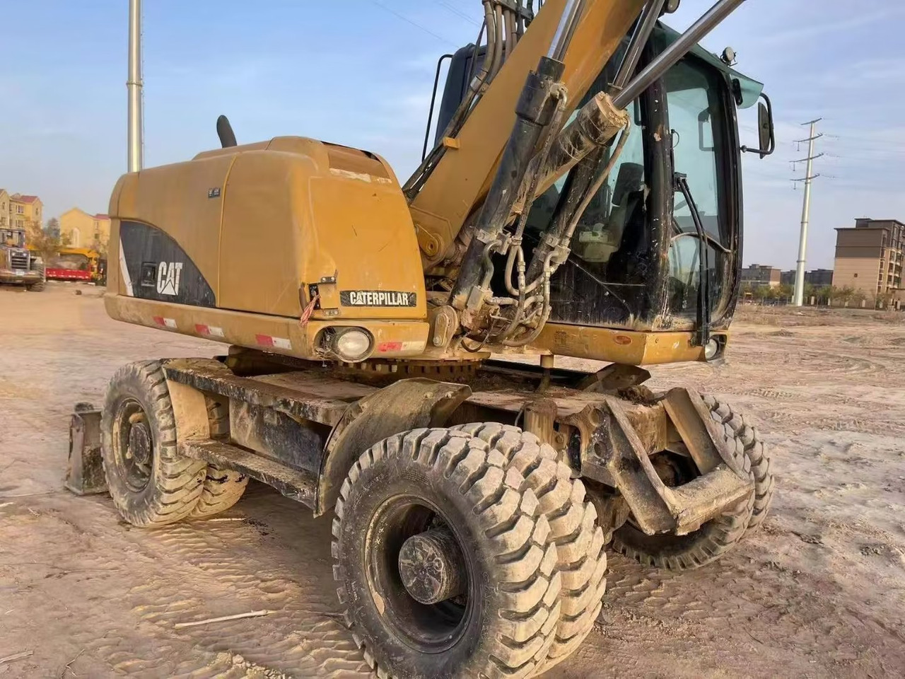 CATERPILLAR M315 - Pelle sur pneus: photos 4 CATERPILLAR M315 - Pelle sur pneus: photos 4