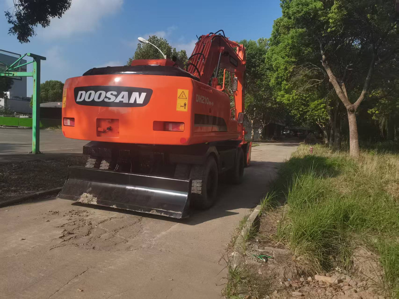 DOOSAN DH210W-9C - Pelle sur pneus: photos 5 DOOSAN DH210W-9C - Pelle sur pneus: photos 5