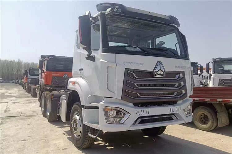 SINOTRUK Hohan NX Truck Price 371 hp 10 Wheeler for Sale In Tanzania - Tracteur routier: photos 1 SINOTRUK Hohan NX Truck Price 371 hp 10 Wheeler for Sale In Tanzania - Tracteur routier: photos 1