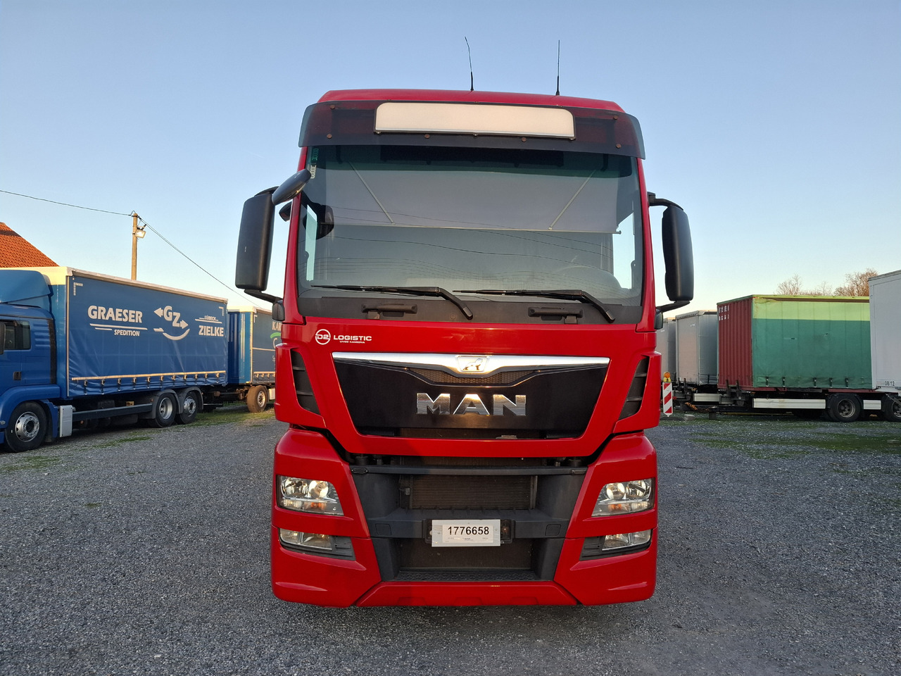 MAN TGX 26.440 E6 + SCHMITZ - Camion à rideaux coulissants: photos 2 MAN TGX 26.440 E6 + SCHMITZ - Camion à rideaux coulissants: photos 2