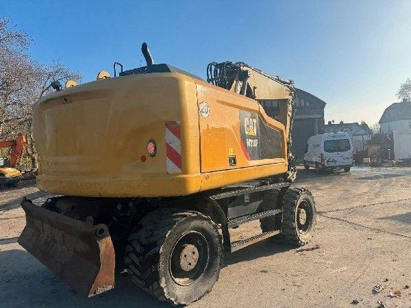 CAT 318F - Pelle sur pneus: photos 3 CAT 318F - Pelle sur pneus: photos 3