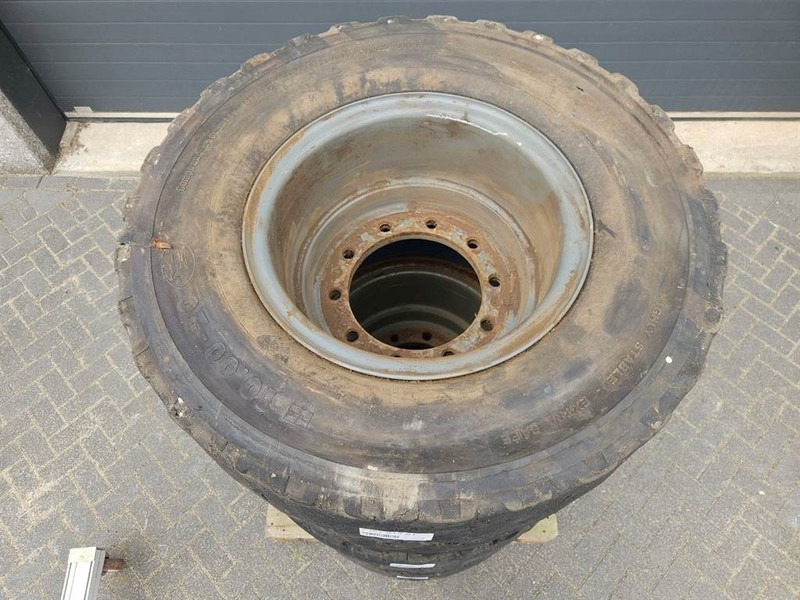 Liebherr 10.00-20 - Tire/Reifen/Band - Pneus et jantes pour Engins de chantier: photos 4 Liebherr 10.00-20 - Tire/Reifen/Band - Pneus et jantes pour Engins de chantier: photos 4