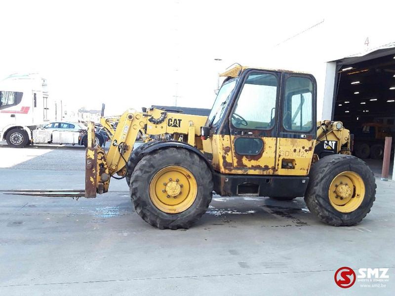 Caterpillar TH 62 - Chariot télescopique: photos 5 Caterpillar TH 62 - Chariot télescopique: photos 5