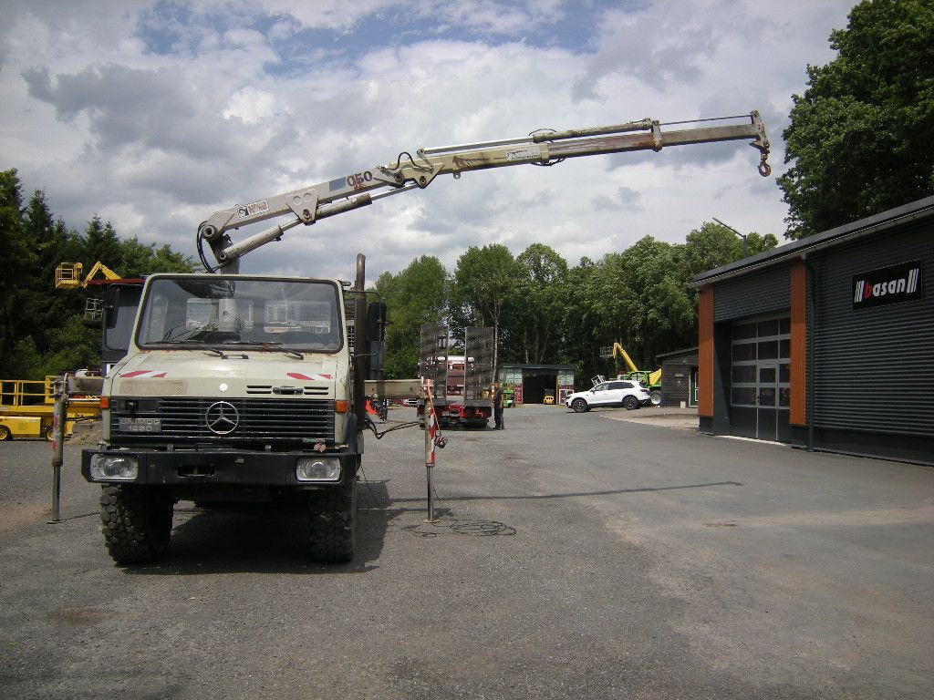 Mercedes-Benz Unimog U1250 mit Kran MKG 105 - Utilitaire benne: photos 1 Mercedes-Benz Unimog U1250 mit Kran MKG 105 - Utilitaire benne: photos 1