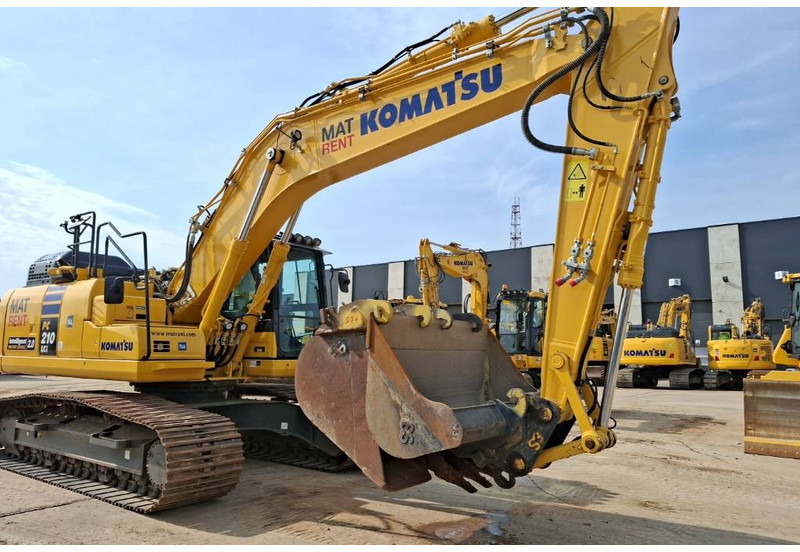 Komatsu PC210LCI-11E0 - Pelle sur chenille: photos 1 Komatsu PC210LCI-11E0 - Pelle sur chenille: photos 1