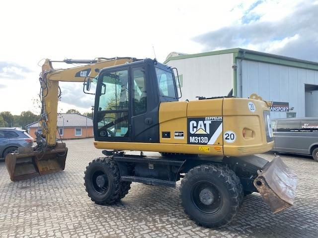 Cat M 313 D MIETE / RENTAL (12005587) - Pelle sur pneus: photos 2 Cat M 313 D MIETE / RENTAL (12005587) - Pelle sur pneus: photos 2