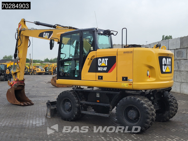 Caterpillar M314 F - Pelle sur pneus: photos 2 Caterpillar M314 F - Pelle sur pneus: photos 2