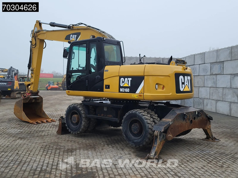 Caterpillar M316 D - Pelle sur pneus: photos 5 Caterpillar M316 D - Pelle sur pneus: photos 5