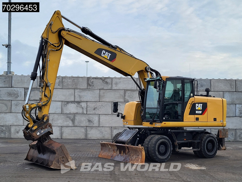 Caterpillar M320 F - Pelle sur pneus: photos 3 Caterpillar M320 F - Pelle sur pneus: photos 3