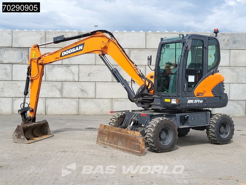 Doosan DX57W-7 - Pelle sur pneus: photos 3 Doosan DX57W-7 - Pelle sur pneus: photos 3