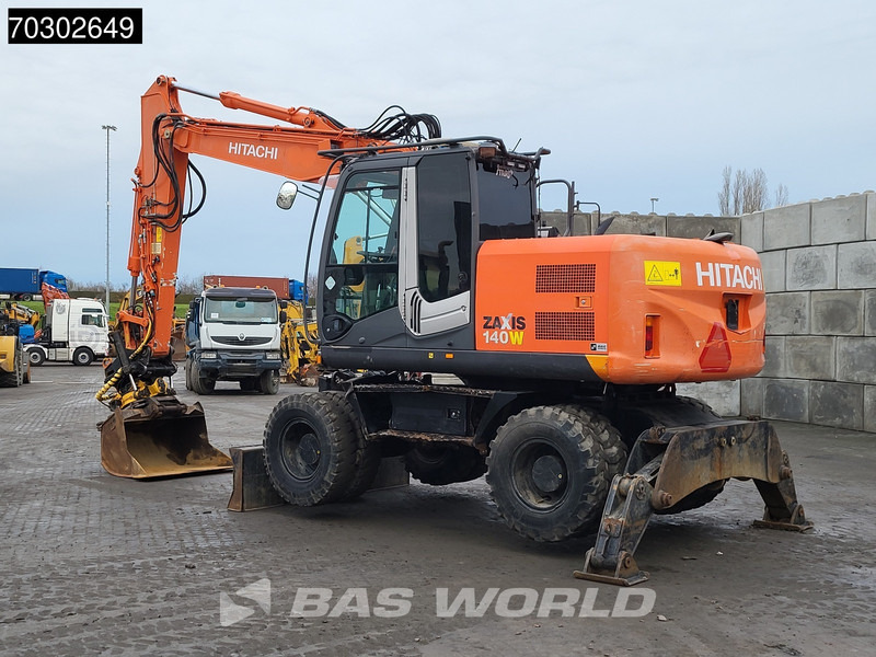 Hitachi ZX140W -3 - Pelle sur pneus: photos 3 Hitachi ZX140W -3 - Pelle sur pneus: photos 3
