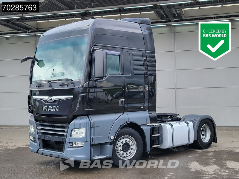 MAN TGX 18.470 4X2 XXL 2x Tanks Retarder Navi Standklima ACC - Tracteur routier: photos 1 MAN TGX 18.470 4X2 XXL 2x Tanks Retarder Navi Standklima ACC - Tracteur routier: photos 1