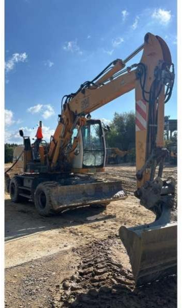 Liebherr A314 Litronic - Pelle sur pneus: photos 4 Liebherr A314 Litronic - Pelle sur pneus: photos 4