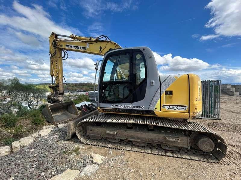 New Holland E145 - Pelle sur chenille: photos 2 New Holland E145 - Pelle sur chenille: photos 2