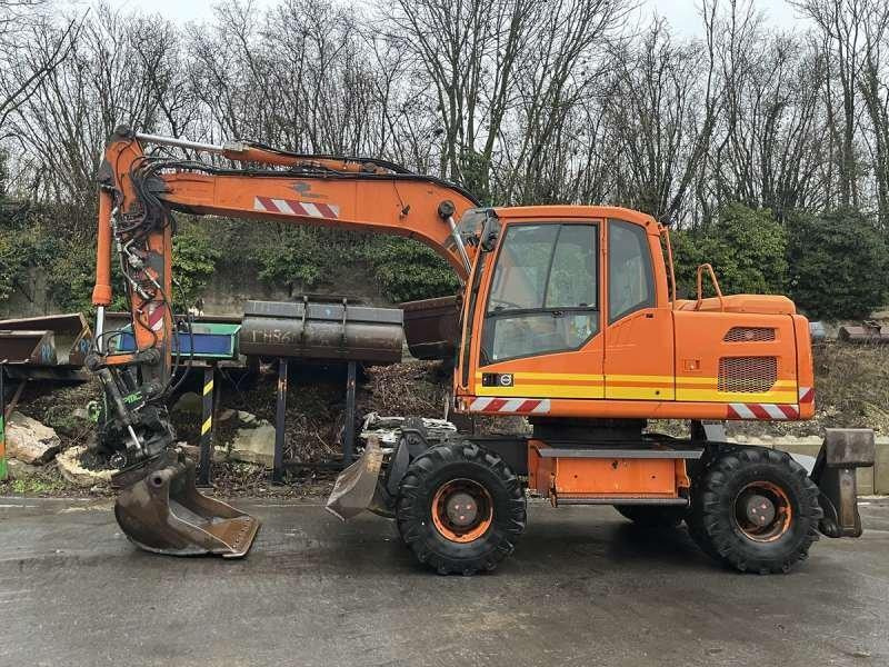 Volvo EW140D - Pelle sur pneus: photos 2 Volvo EW140D - Pelle sur pneus: photos 2