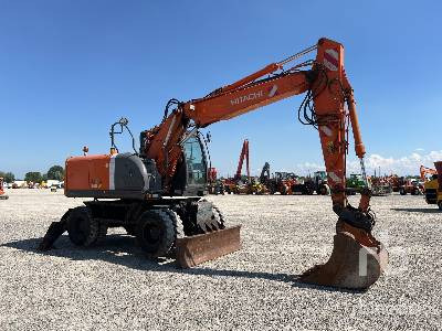HITACHI ZX140W-3 - Pelle sur pneus: photos 4 HITACHI ZX140W-3 - Pelle sur pneus: photos 4