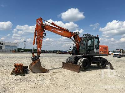 HITACHI ZX140W-3 - Pelle sur pneus: photos 1 HITACHI ZX140W-3 - Pelle sur pneus: photos 1