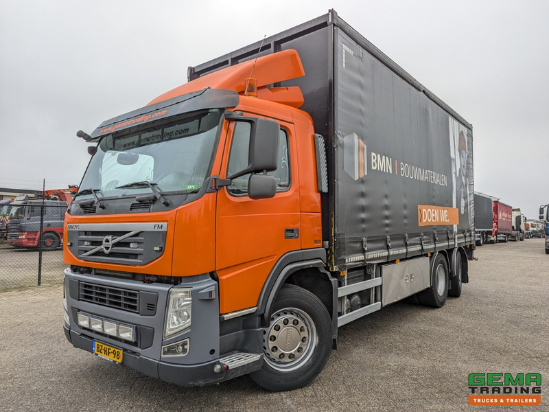 Volvo FM330 6x2/4 Daycab Euro5 EEV - SchuifzeilenBak 6.7m. - KooiAap Aansluiting - HH Vloer - Rongen - Camion à rideaux coulissants: photos 1 Volvo FM330 6x2/4 Daycab Euro5 EEV - SchuifzeilenBak 6.7m. - KooiAap Aansluiting - HH Vloer - Rongen - Camion à rideaux coulissants: photos 1