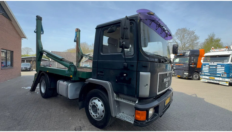 MAN 12.232 F 4X2 Portaalarm 454.090KM NL Truck, Top conditie! - Camion multibenne: photos 2 MAN 12.232 F 4X2 Portaalarm 454.090KM NL Truck, Top conditie! - Camion multibenne: photos 2