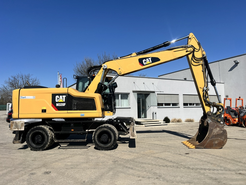 Caterpillar M 320 F (111527) - Pelle sur pneus: photos 4 Caterpillar M 320 F (111527) - Pelle sur pneus: photos 4
