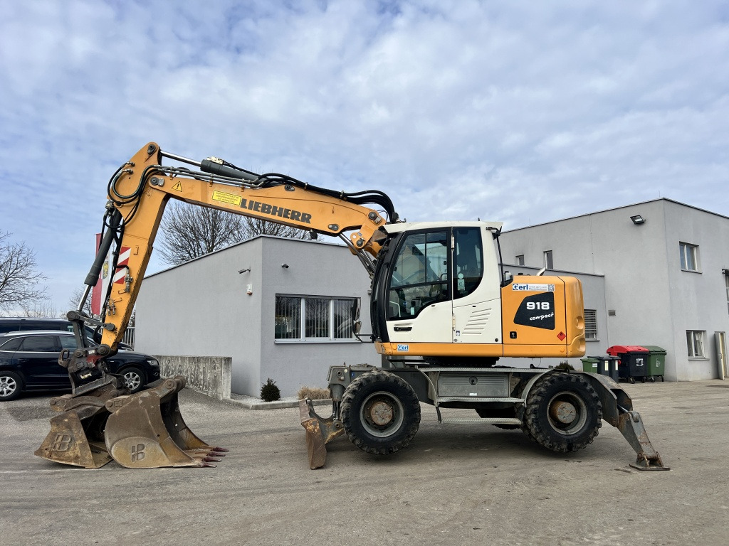 Liebherr A 918 C-Litronic (111509) - Pelle sur pneus: photos 1 Liebherr A 918 C-Litronic (111509) - Pelle sur pneus: photos 1