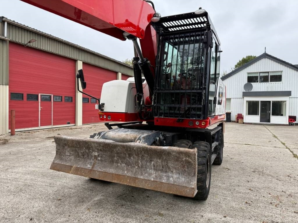 CAT M320F - Pelle sur pneus: photos 4 CAT M320F - Pelle sur pneus: photos 4