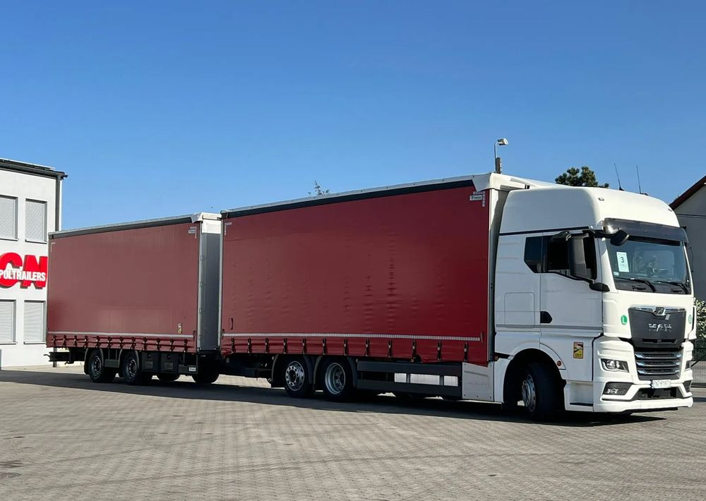 MAN TGX 26.470 z przyczepą Redos - Camion à rideaux coulissants: photos 2 MAN TGX 26.470 z przyczepą Redos - Camion à rideaux coulissants: photos 2