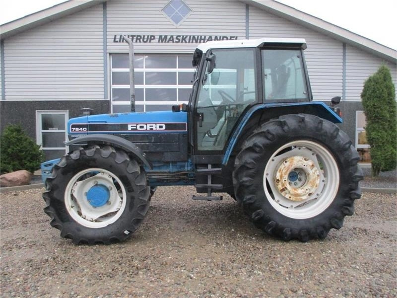 New Holland 7840 SLE, med rigtig god dæk montering og knap på - Tracteur agricole: photos 1 New Holland 7840 SLE, med rigtig god dæk montering og knap på - Tracteur agricole: photos 1