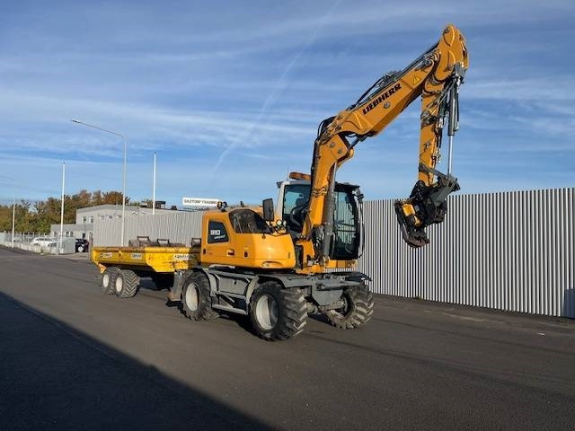 Liebherr A 910 Compact - Pelle sur pneus: photos 3 Liebherr A 910 Compact - Pelle sur pneus: photos 3