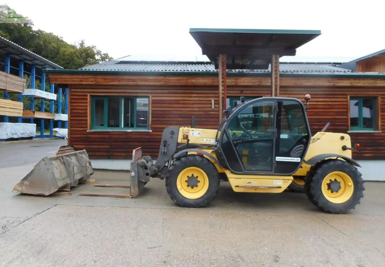 New Holland lm732 mit schaufel und gabel - Chariot télescopique: photos 1 New Holland lm732 mit schaufel und gabel - Chariot télescopique: photos 1